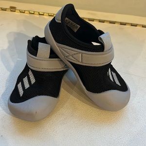 Boys adidas mesh shoes.